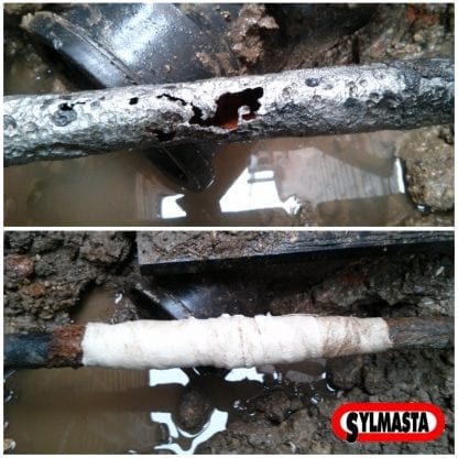 A badly cracked cast iron pipe which was 90 year old fixzed using a SylWrap Standard Pipe Repair Kit