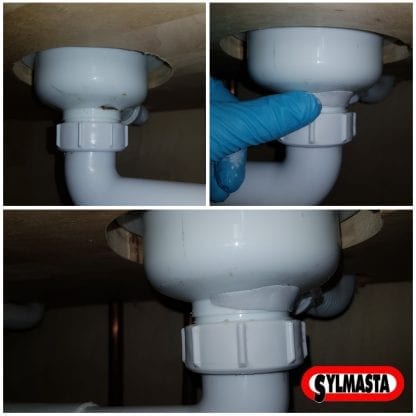 A cracked PVC plastic pipe in a bathroom is repaired using Superfast Plastic Epoxy Putty Stick
