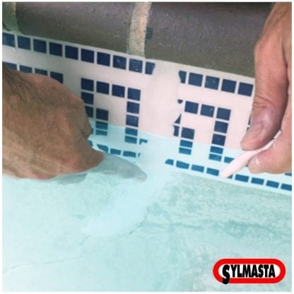 A cracked tile in a swimming pool undergoes an underwater repair carried out using Superfast Aqua Expoxy Putty Stick