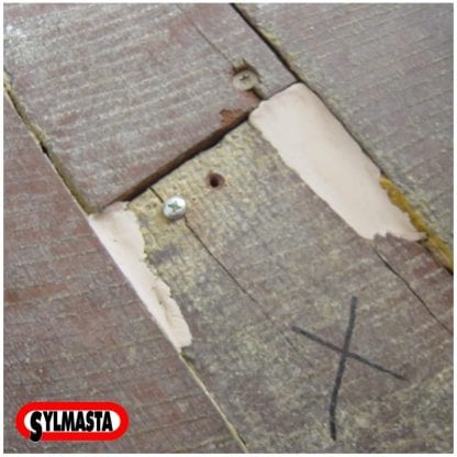Superfast Wood Epoxy Putty Stick used as a filler to repair holes in wooden panels