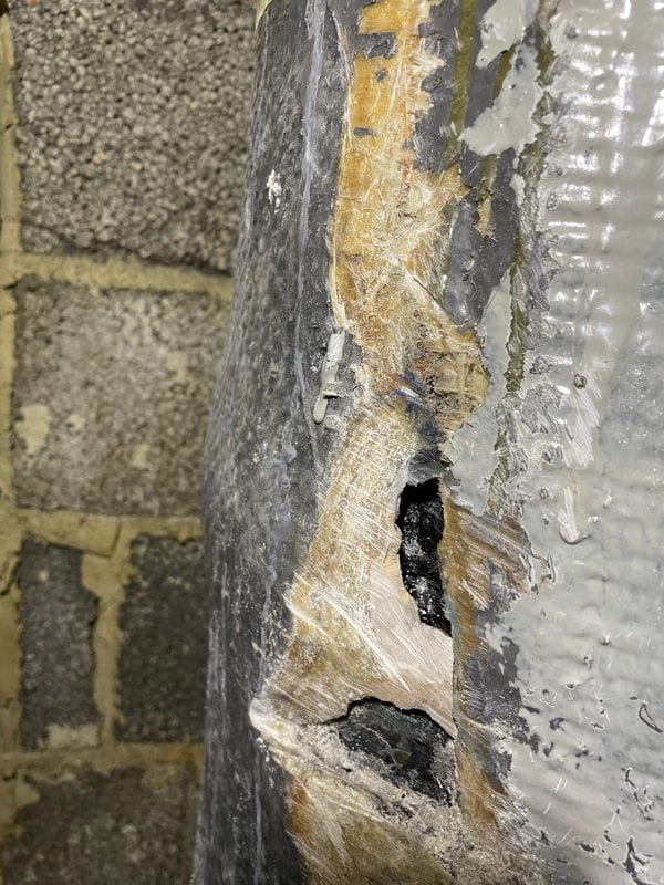Deep cavity in a 300mm air conditioning water return pipe requiring repair