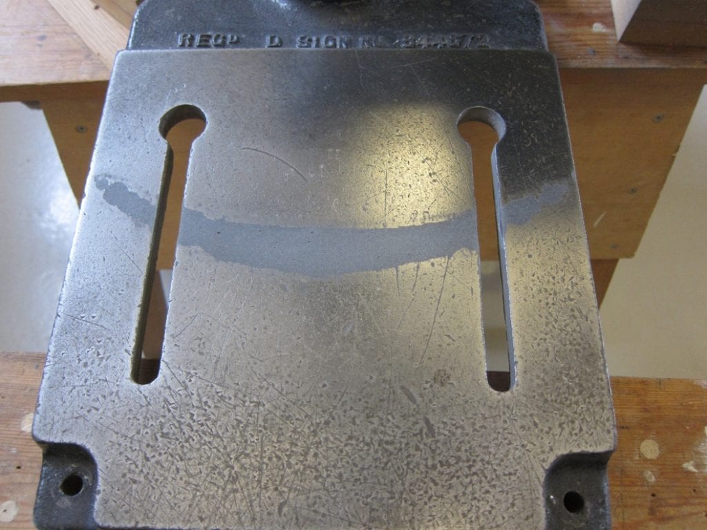 Completed repair of a drill base stand using Industrial Metal Epoxy Paste