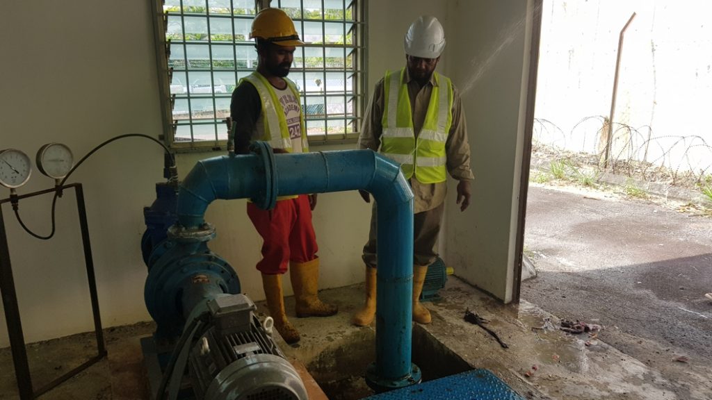 A pinhole leak on an elbow joint in a Malaysia pumping station prior to undergoing a live leak repair