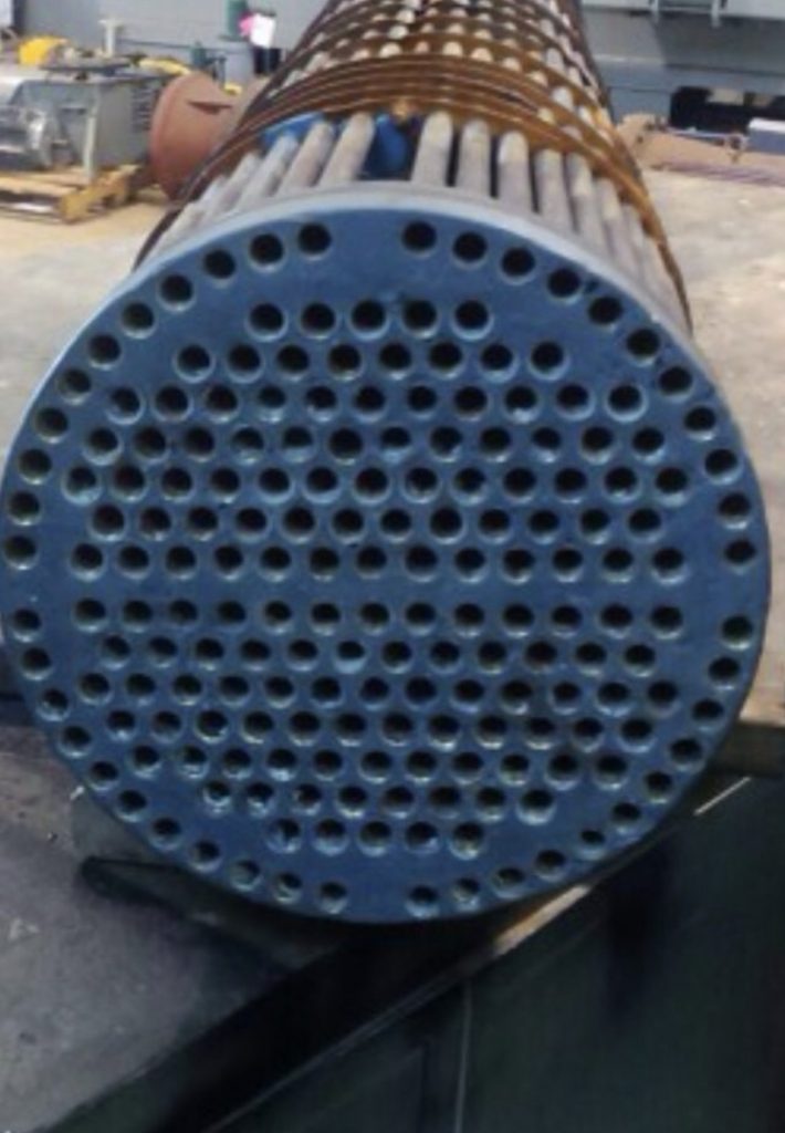 Ceramic Supergrade Epoxy Paste used to rebuild the cast iron face of a condenser unit damaged by heavy corrosion in a repair and refurbishment application