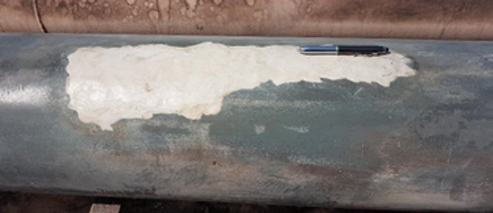 Heavily corroded section of steel pipe having undergone repair with Sylmasta AB Original Epoxy Putty