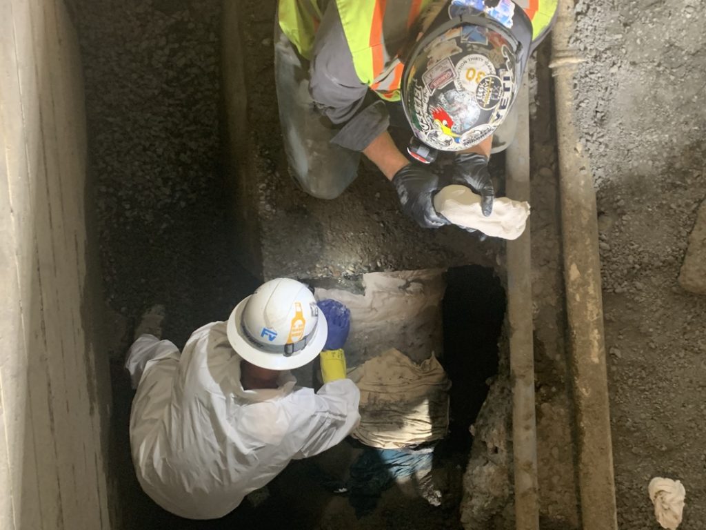 Sylmasta AB Original Epoxy Putty Stick used in the repair of a concrete water main pipe break in Canada