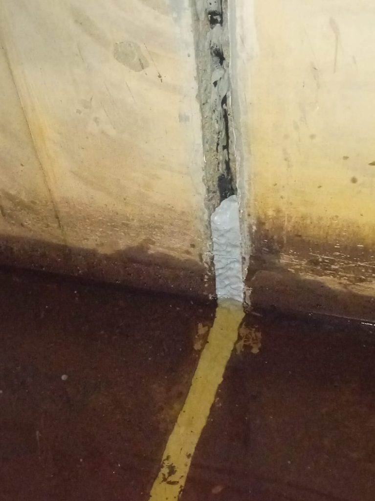 Flood defence wall at a UK dam undergoes repair using Sylmasta AB Original Epoxy Putty after gaps appeared