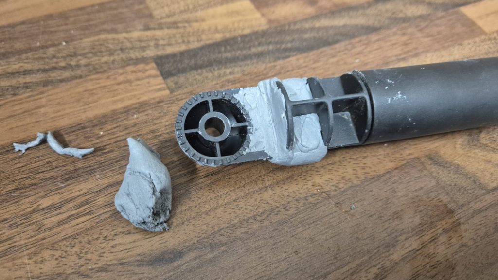 Broken Christmas projection light bonded back together in a repair made with Superfast Aluminium Epoxy Putty