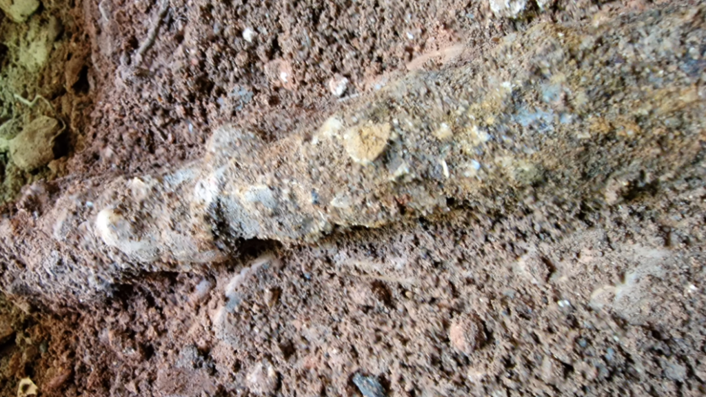 Stones imbedded in a domestic water main pipe before the line underwent a Sylmasta repair and refurbishment