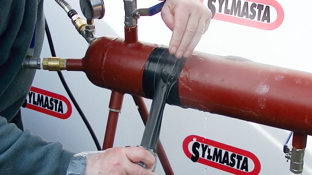 A demonstration at Sylmasta HQ in the United Kingdom shows how to use Wrap & Seal Pipe Burst Tape to repair a live leak on a stainless steel pipe