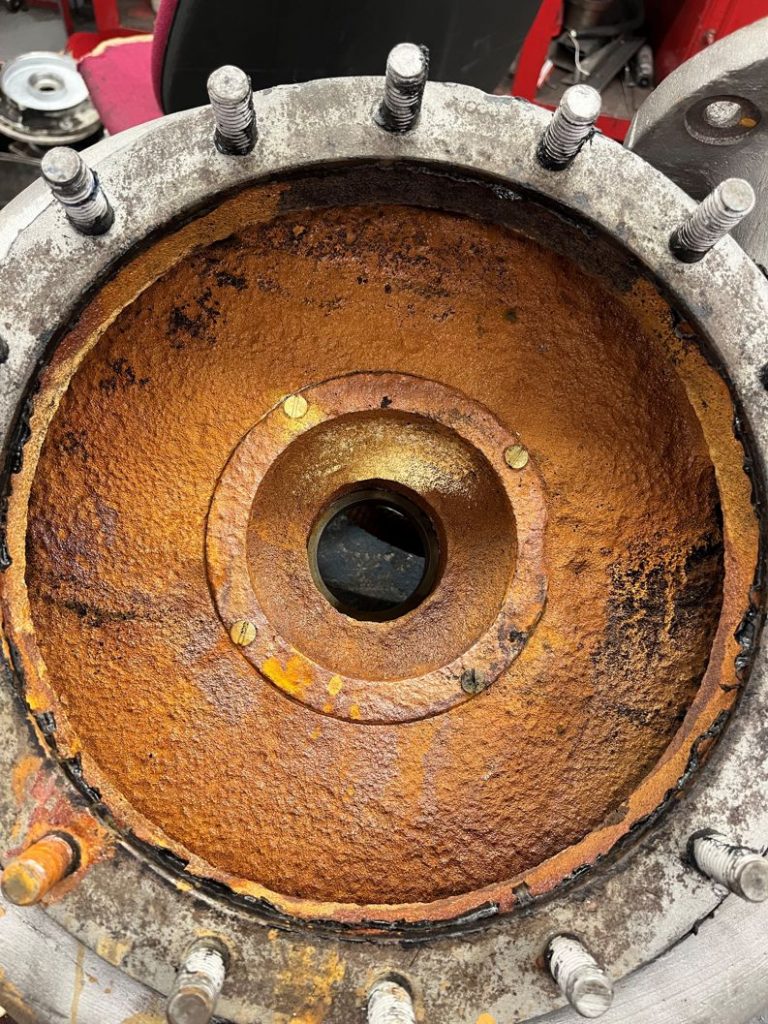 Heavily corroded inside of an old Worthington Simpson pump before repair and refurbishment with Liquid Metal Epoxy Coating