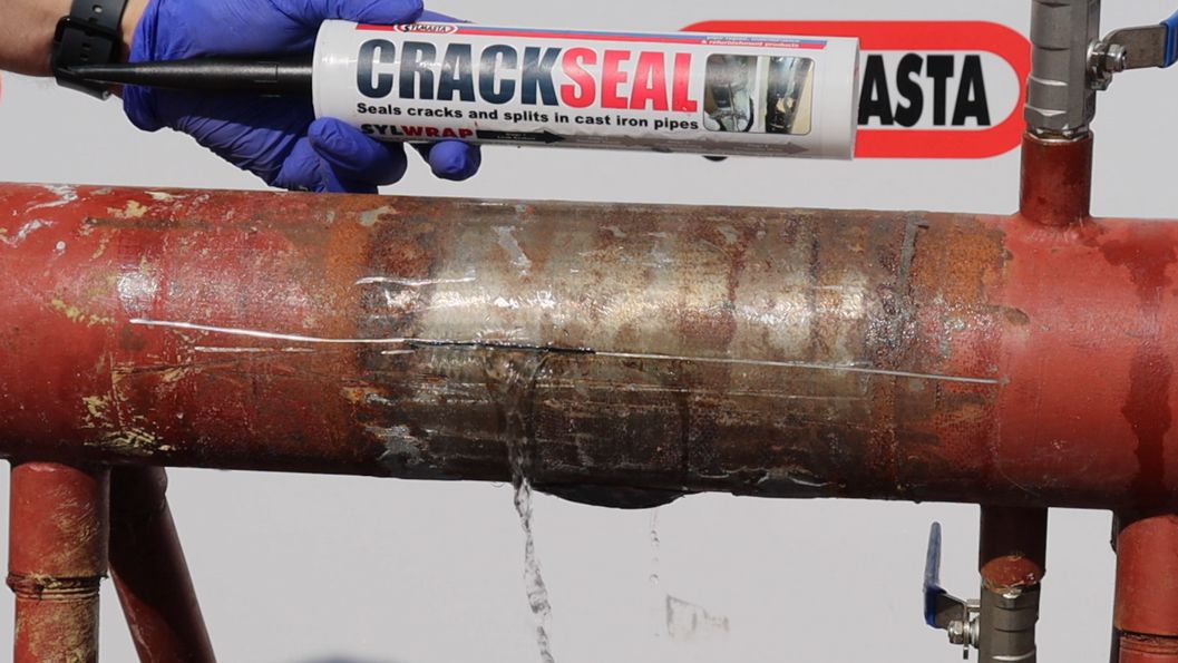 CrackSeal Pipe Sealant and SylWrap HD Pipe Repair Bandage make a permanent live leak repair to a cast iron pipe capable of withstanding up to 10 bar pressure