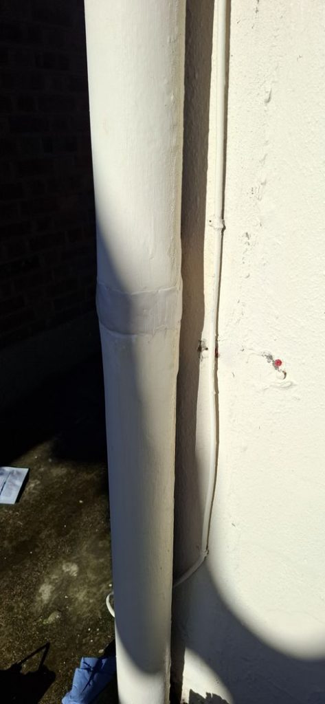 Sylmasta AB Original seals a crack around the diameter of a soil vent pipe