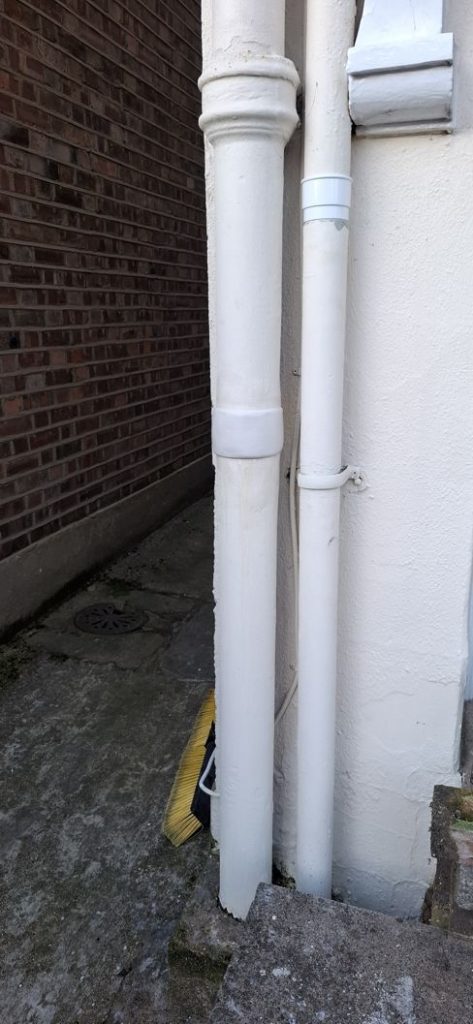 Sylmasta AB Original formed to look like a pipe joint, disguising a repair in a soil vent stack