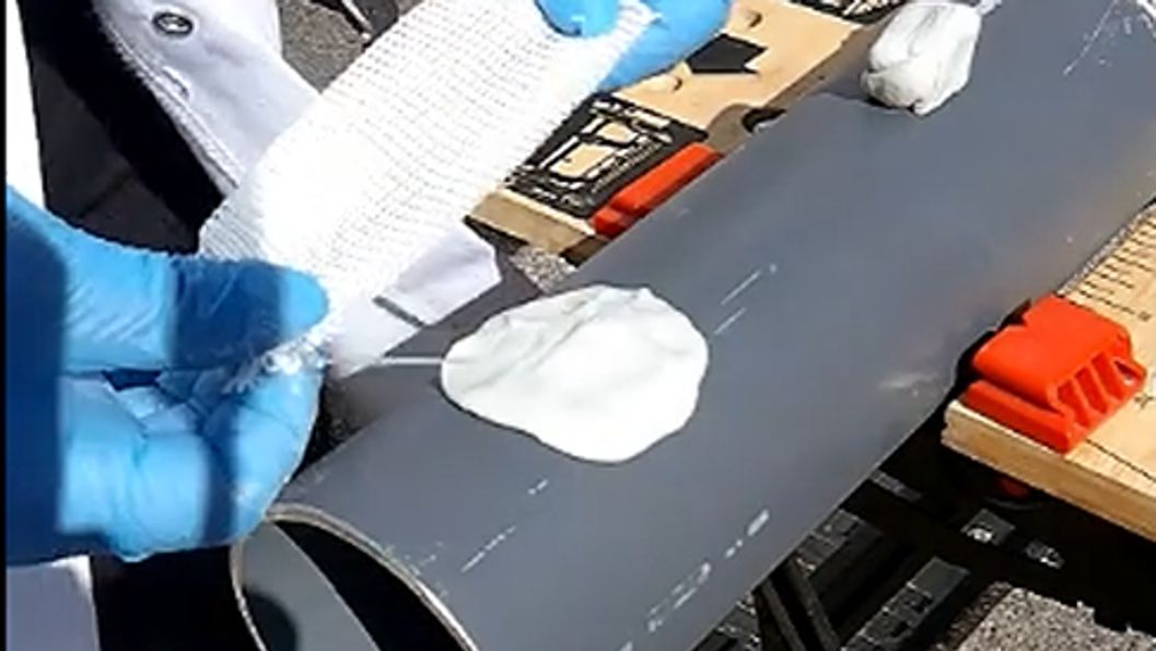 Sylmasta AB Original Epoxy Putty and Fibreglass Tape are used to strengthen a weakened pipe