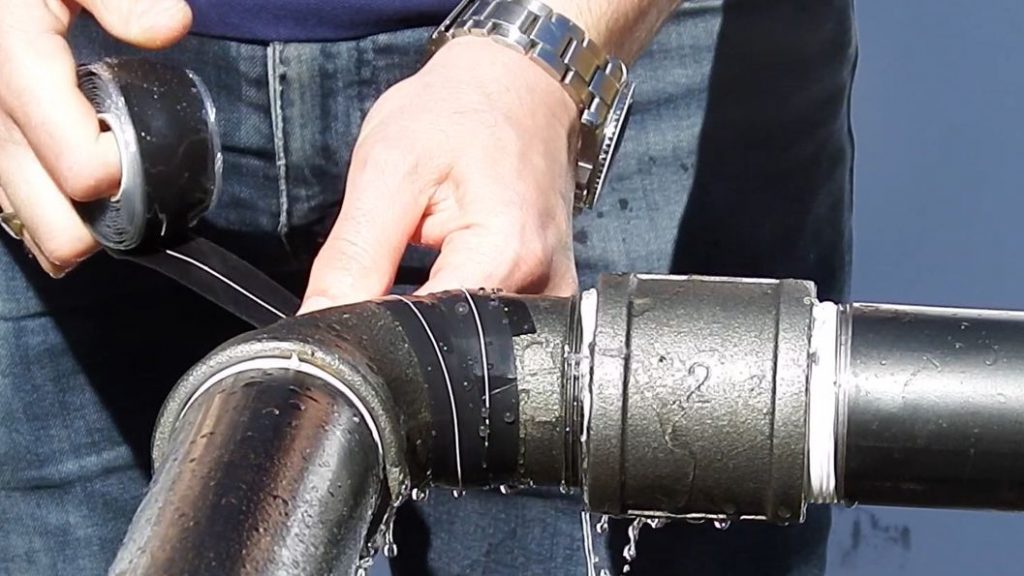 Wrap & Seal Pipe Burst Tape used to fix a leaking 90-degree elbow bend with water pressure still on