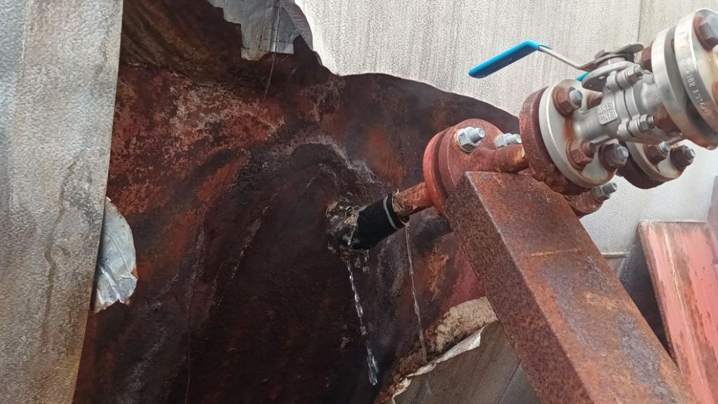 Wrap & Seal Pipe Burst Tape applied to an injection pipe during the repair of a leaking deaerator